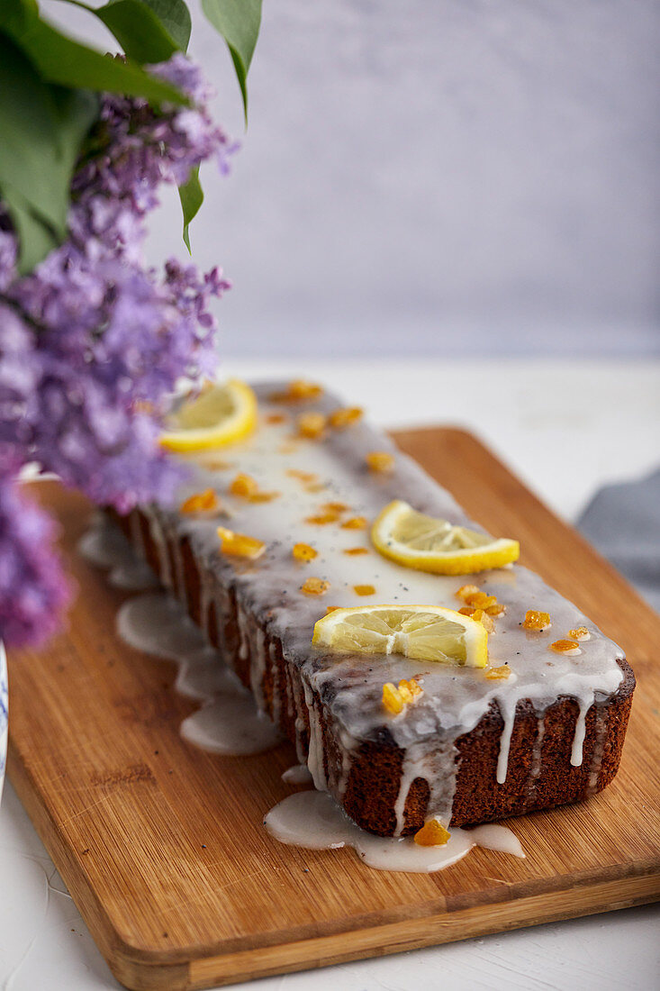 Poppy seed and lemon cake topped with sugar icing