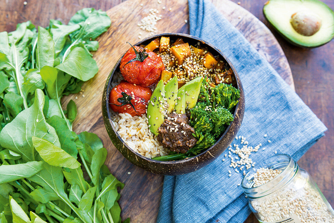 Rainbow lunch bowl with roasted pumpkin and black bean dip