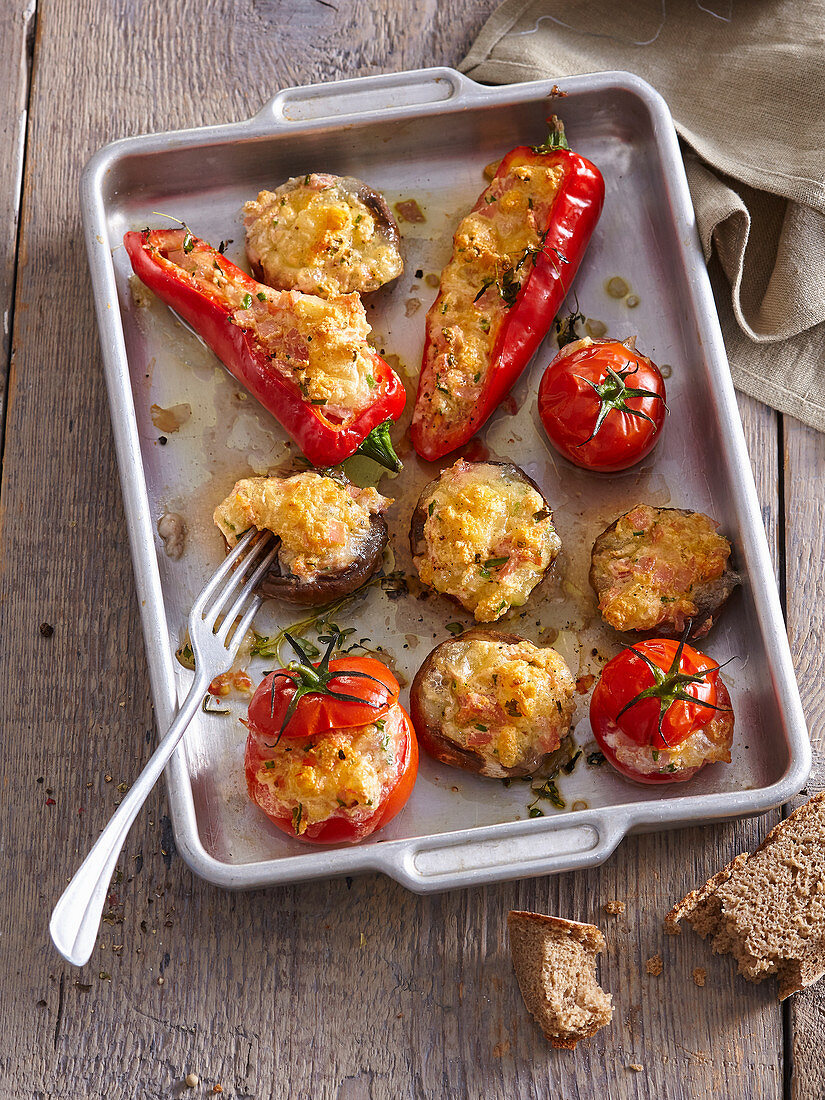 Tomatoes, red pepper and mushrooms stuffed with cheese
