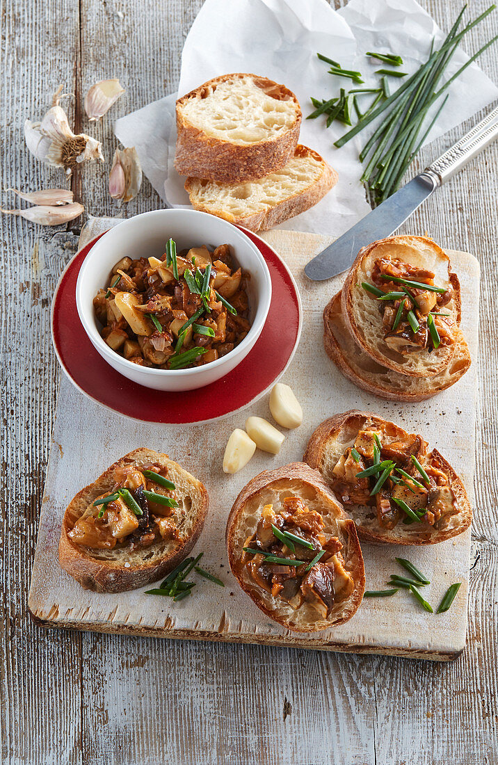Mushrooms chopped with garlic and chives served on Crostini