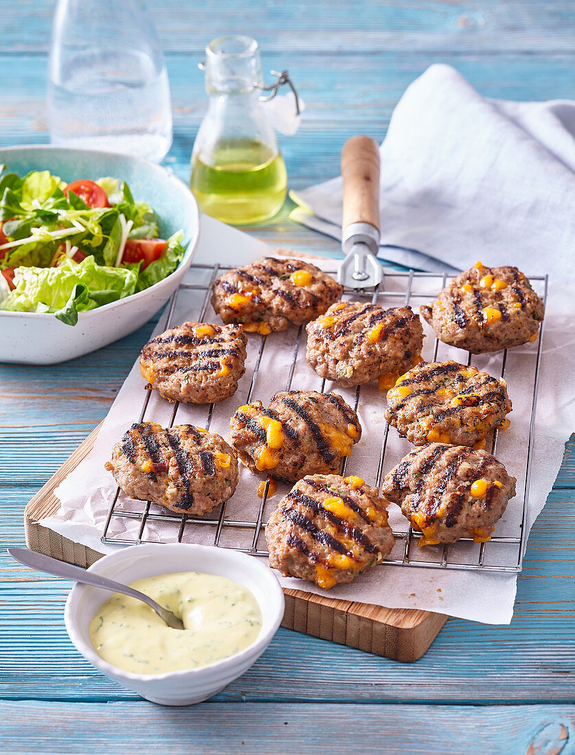 Grilled rissoles with vegetable salad