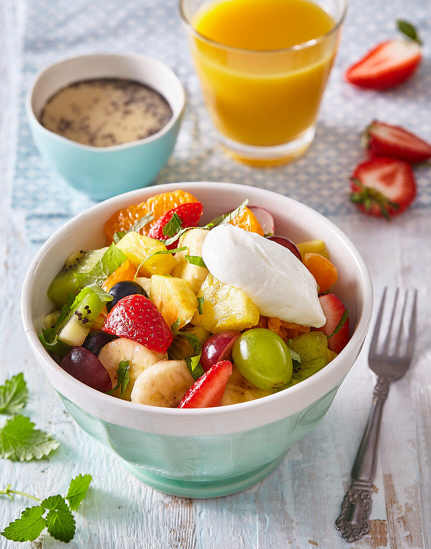 Fruit salad with honey and poppy seed dressing