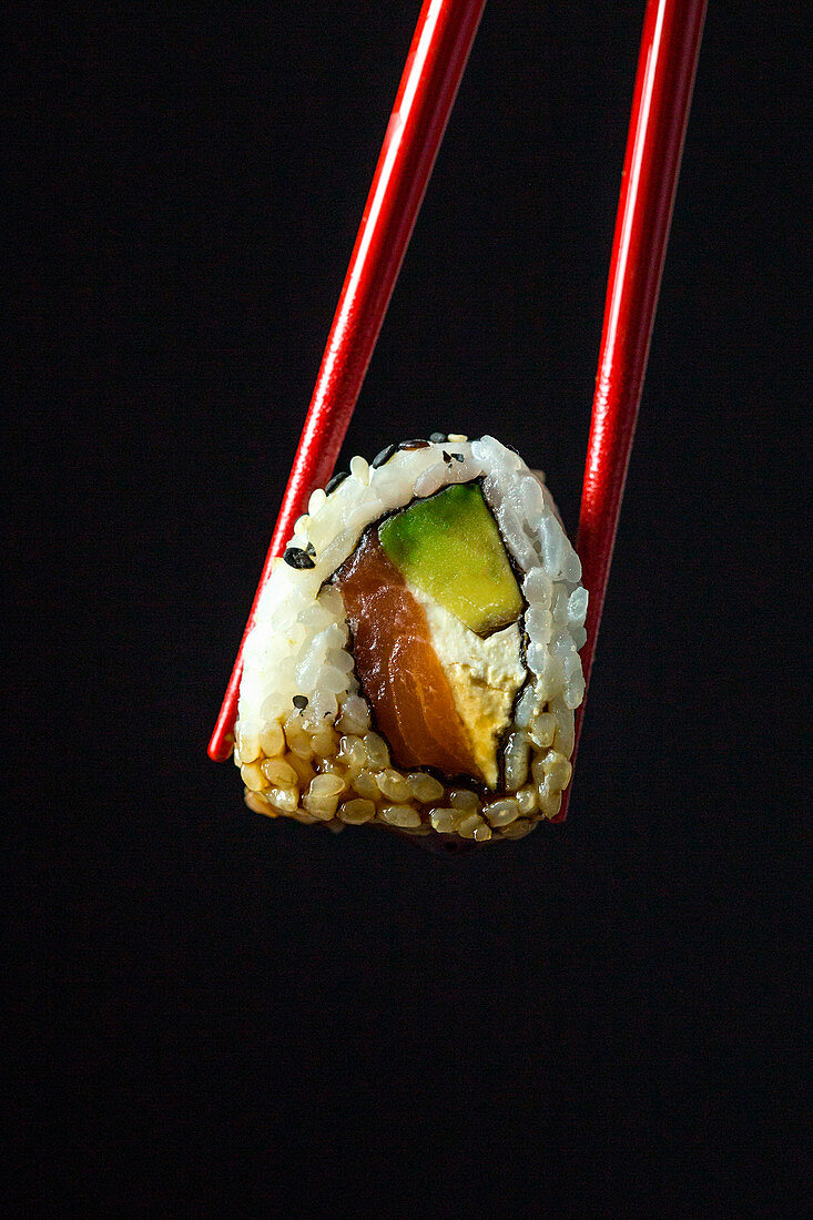 Philadelphia sushi roll with salmon and avocado