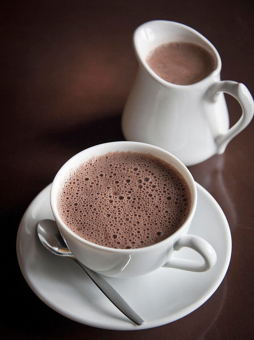 Chocolat Chaud or hot chocolate in cup and jug