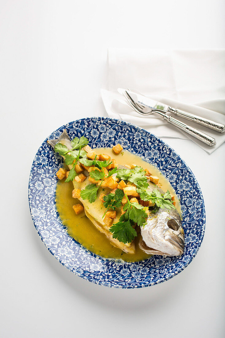 Sea bream with lime sauce and fresh coriander