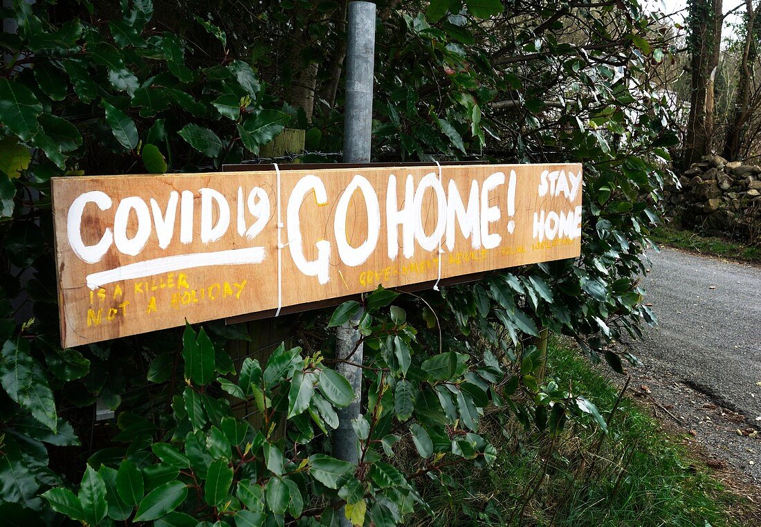 Covid 19 Go Home' sign