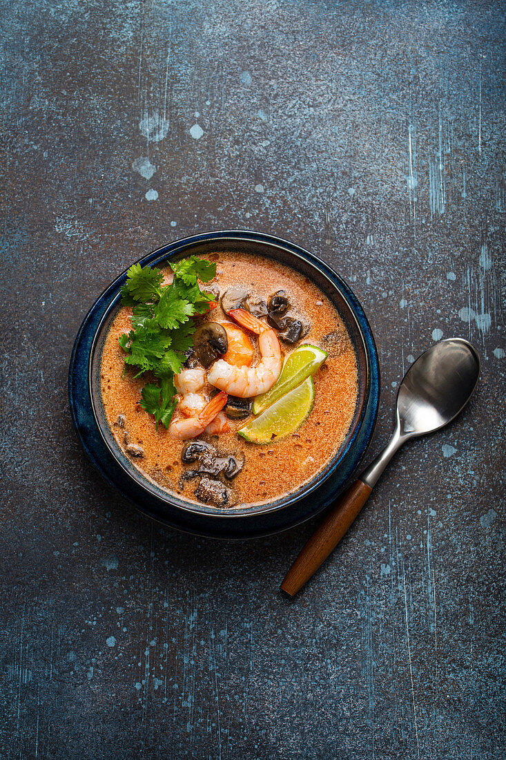 Spicy Thai soup Tom Yum with shrimp and seafood