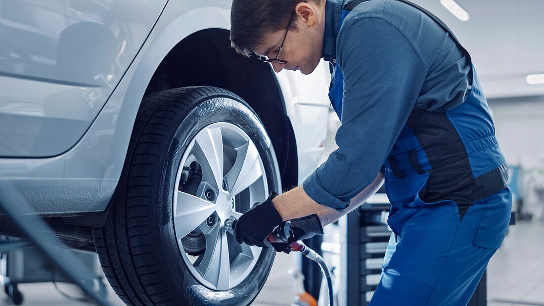 Mechanic working on car