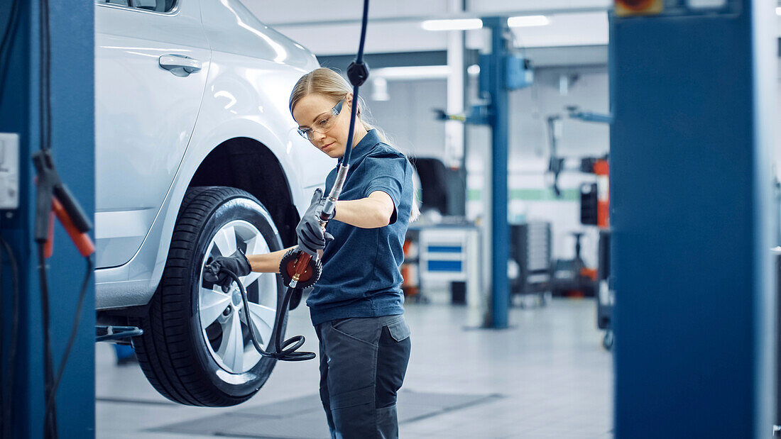 Mechanic working on car