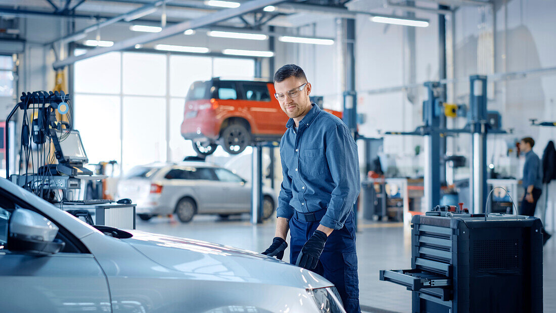 Mechanic working on car