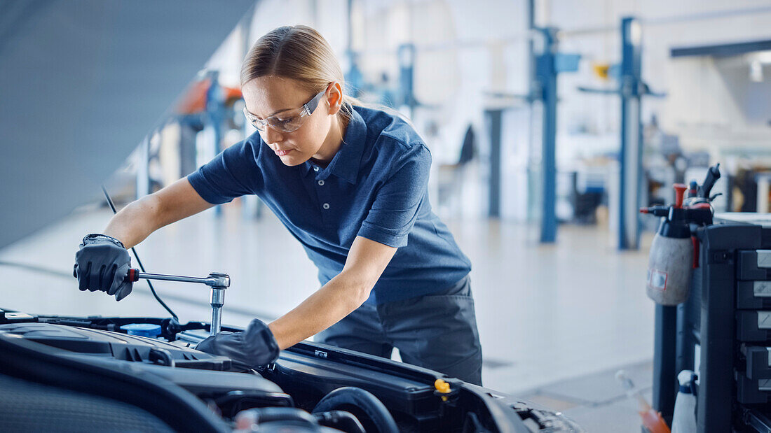 Mechanic working on car