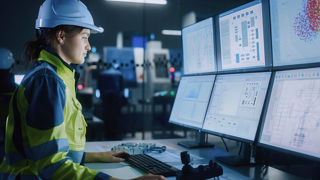 Engineer in factory control room