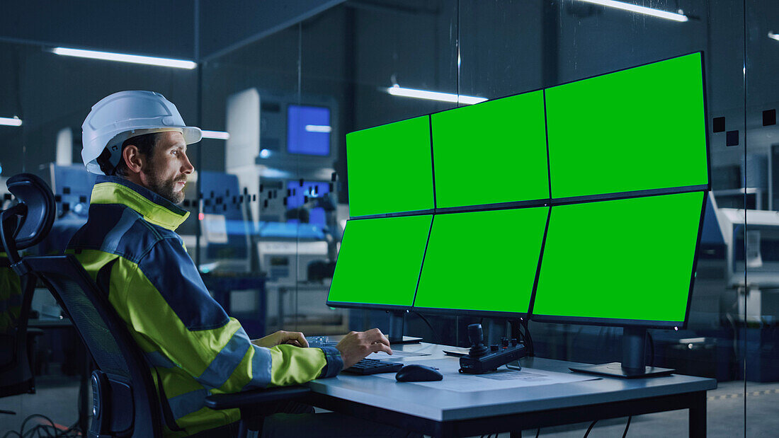 Engineer in factory control room