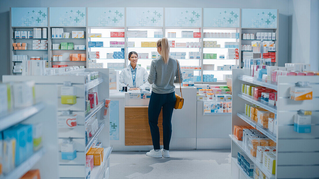 Customer buying medicine in a pharmacy