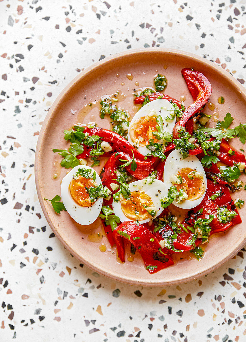 Roast peppers with ‘jammy’ eggs and almond and parsley dressing