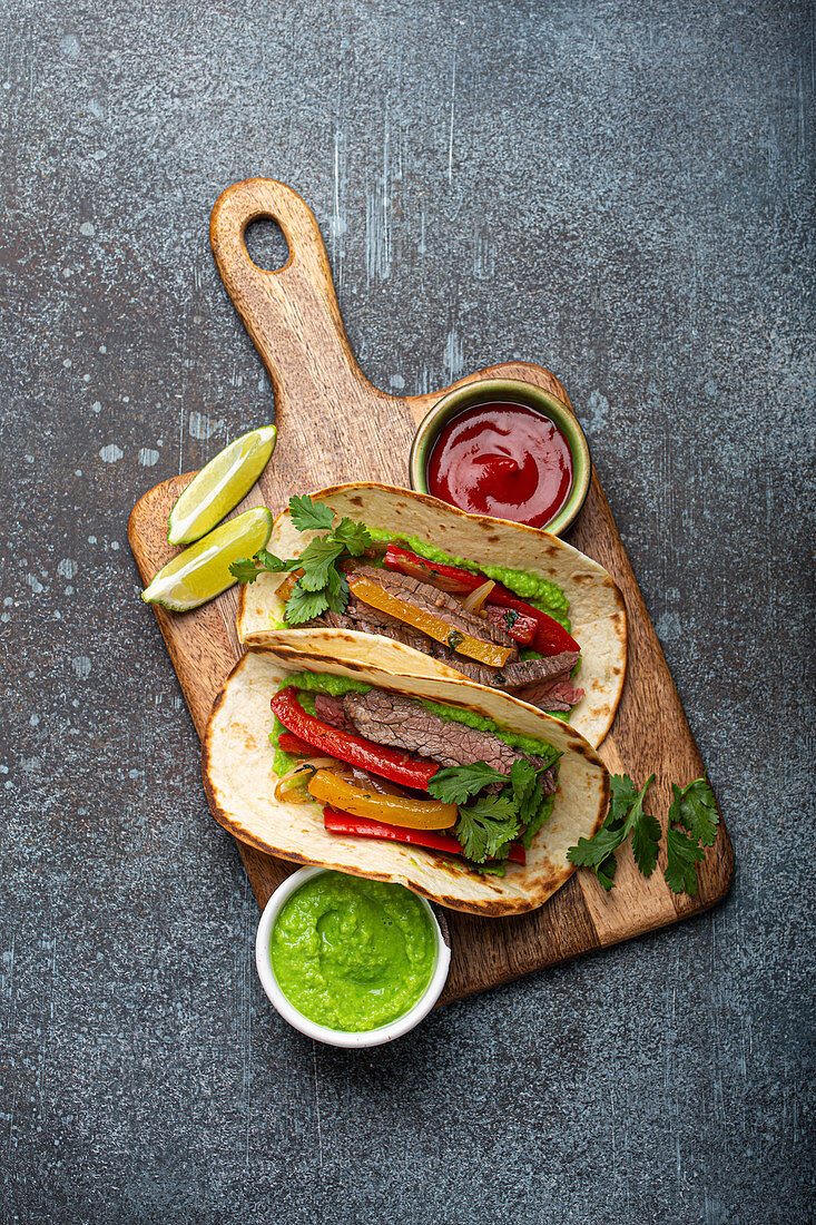 Mexican beef fajita tacos with bell peppers