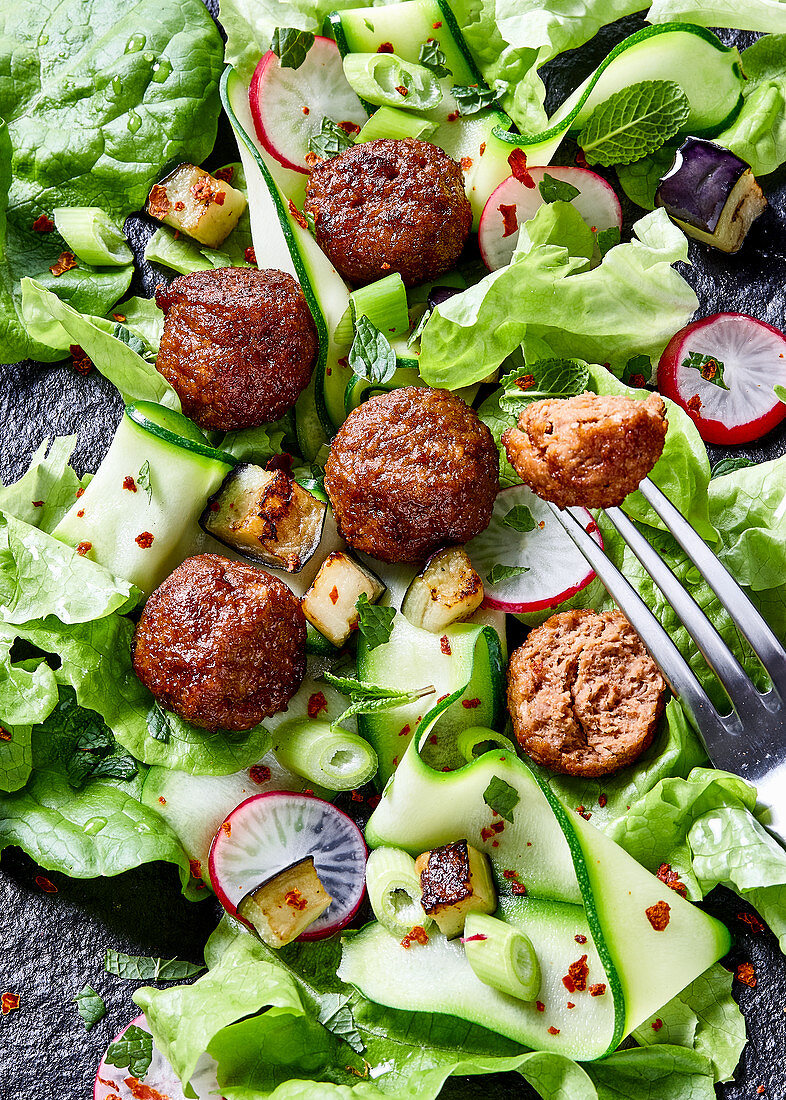 Vegetarian soy meatballs (meat substitute) with salad