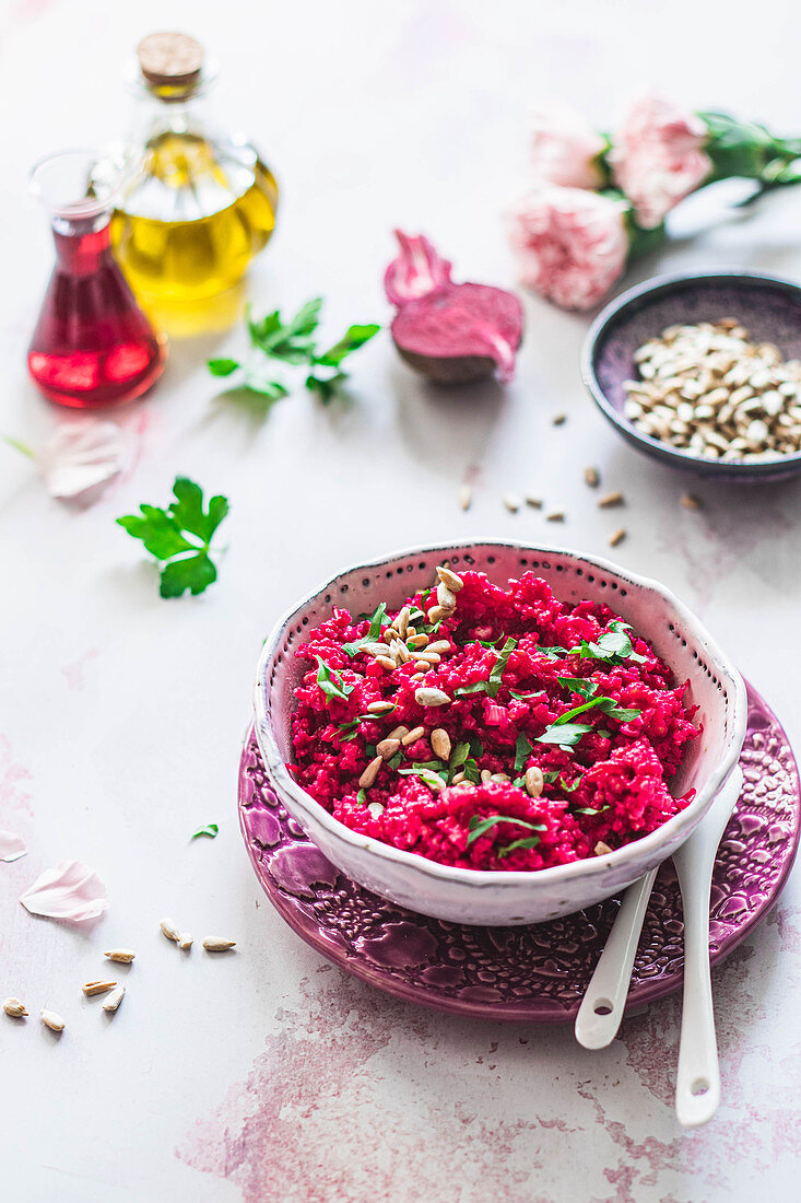 Groats with beetroot vinaigrette and sunflower seeds