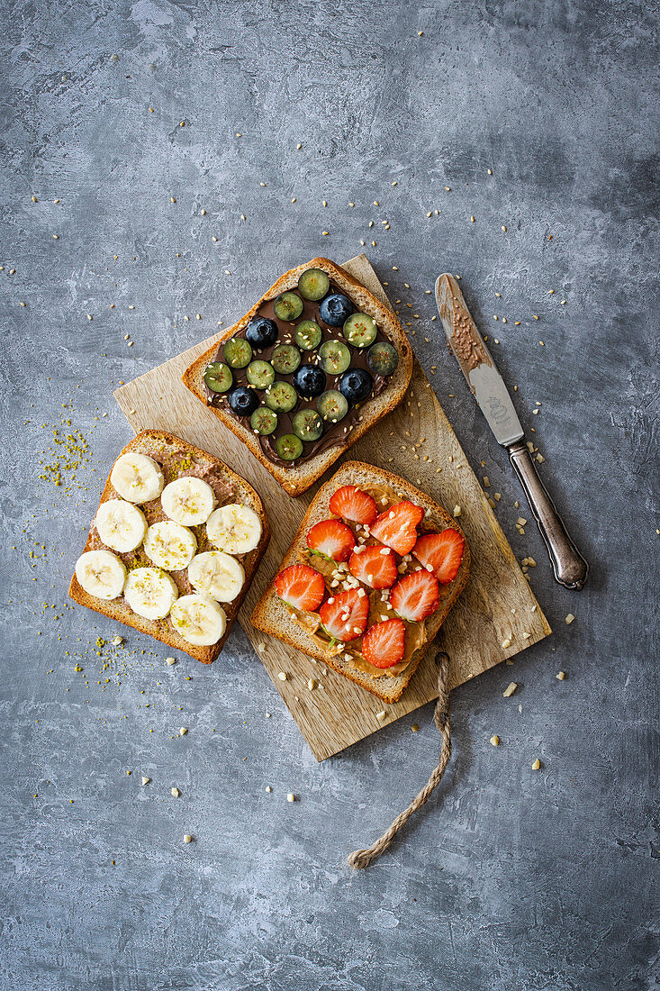 Homemade wholemeal toast with sweet spreads and fruits