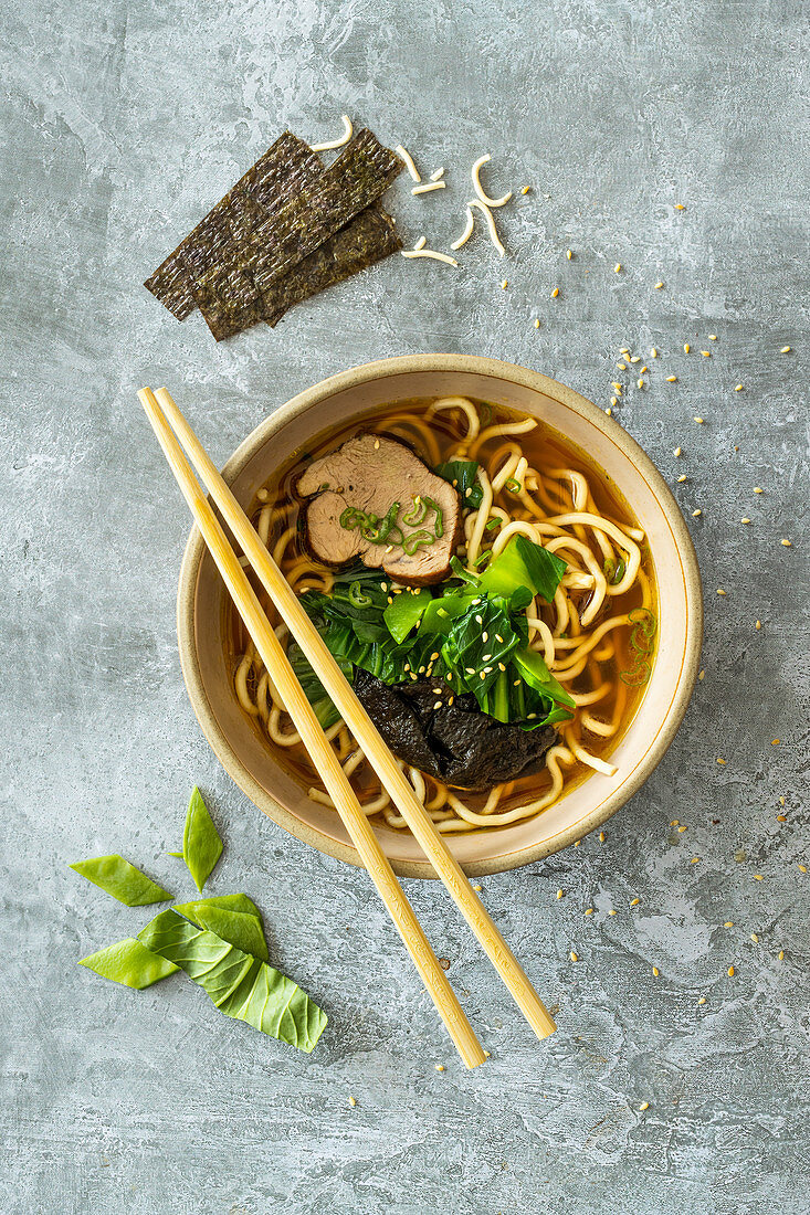 Ramen soup with pork loin cooked in soy sauce and rice wine