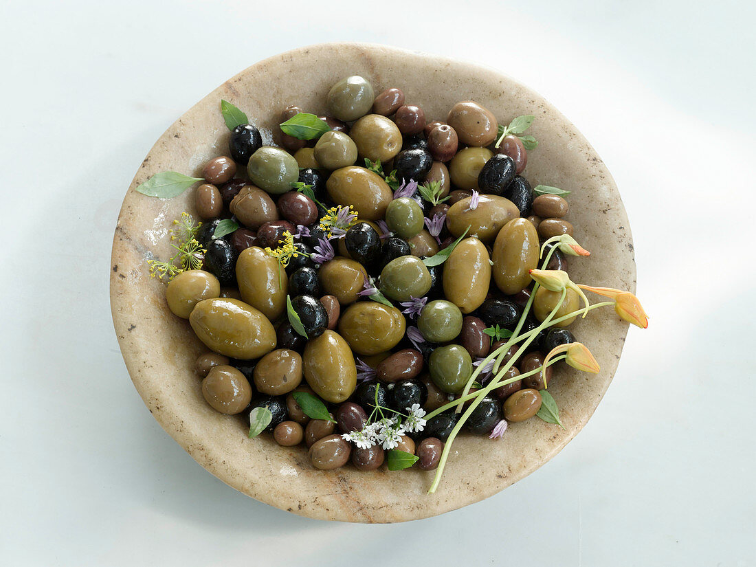 Bowl with black and green olives