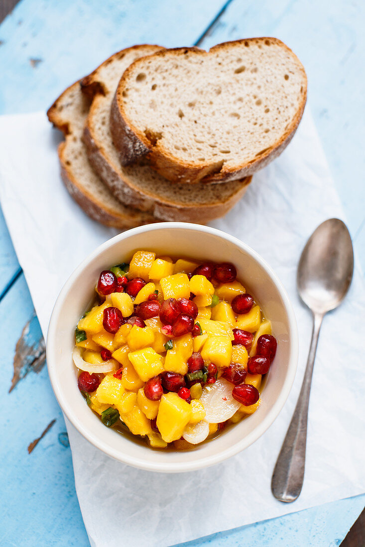 Mango salad with pomegranate seeds