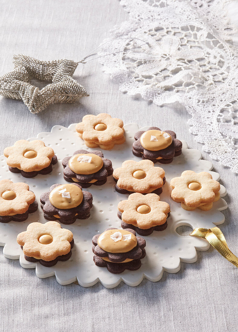 Linzer Christmas cookies with caramel cream and salt
