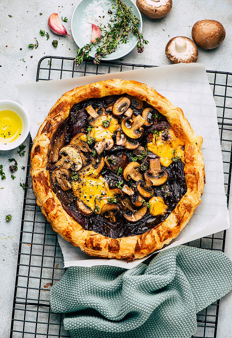 Galette with caramelized onions, mushrooms and cheese