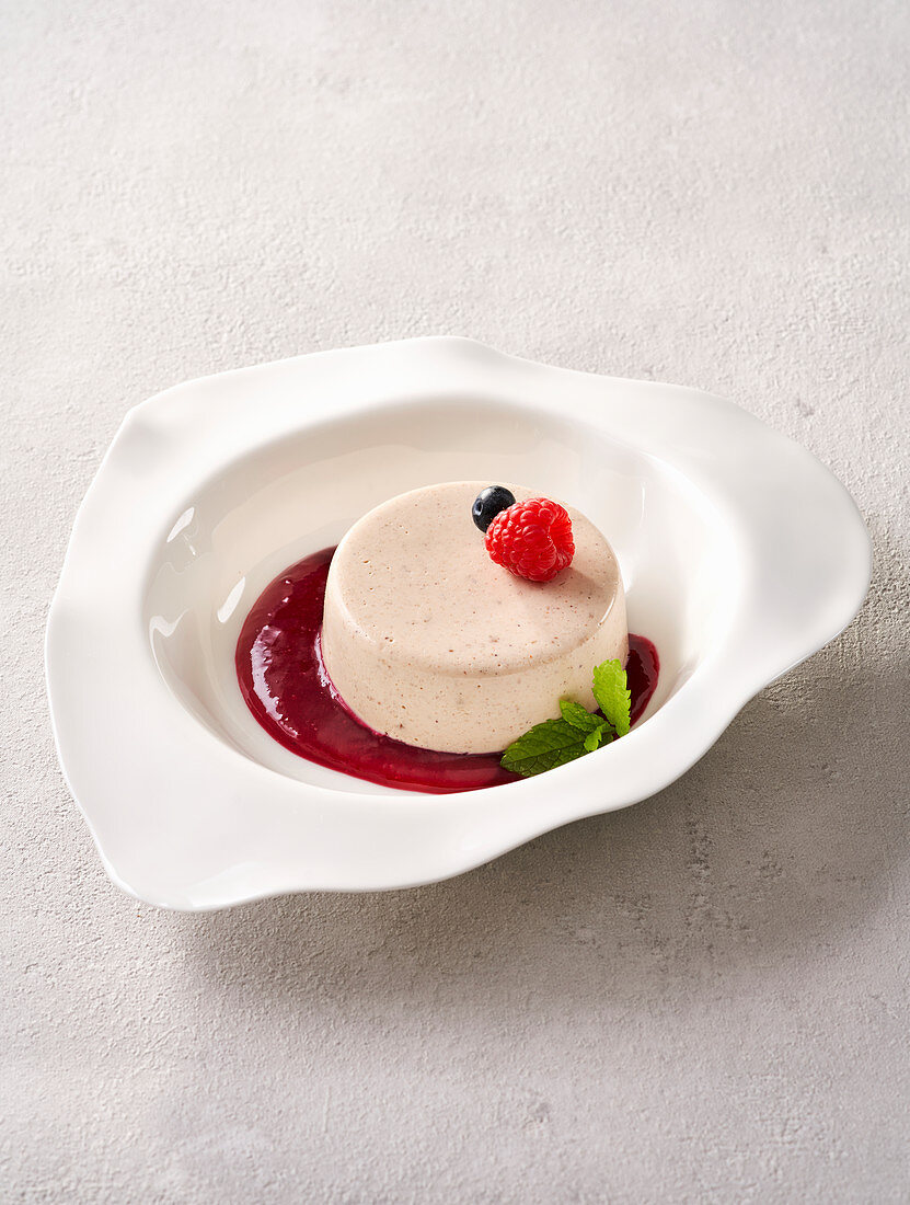 Ginger panna cotta with forest berry sauce (vegan)
