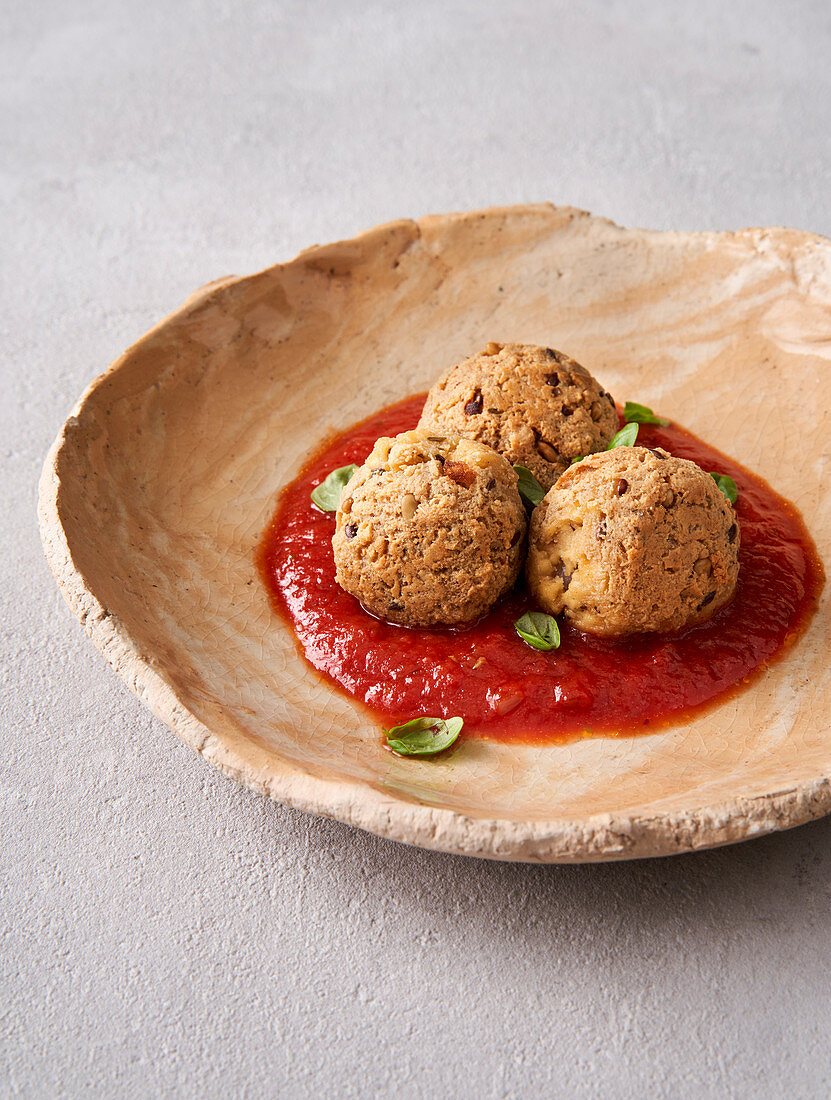 Sesame Tofu balls with tomato sauce (vegan)