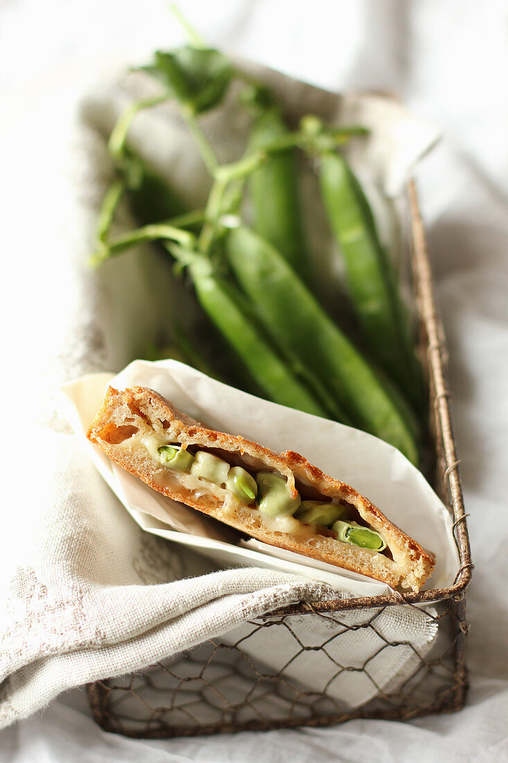 Focaccia with broad beans and pecorino cheese