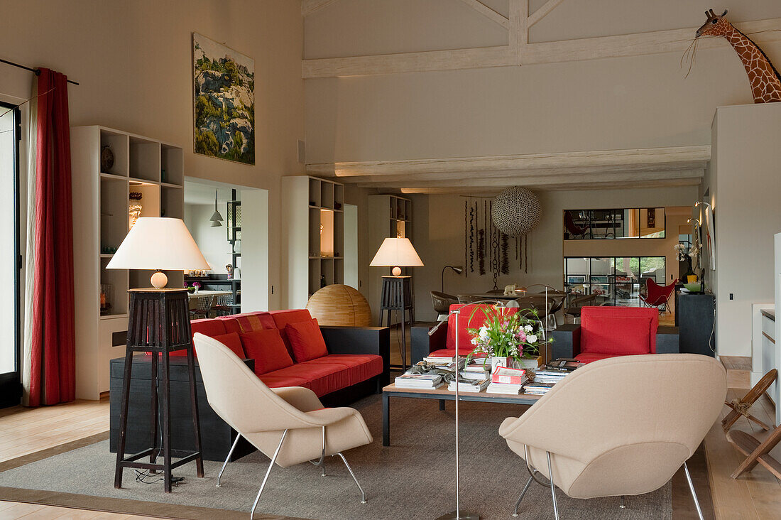 Living room with various seating in converted warehouse