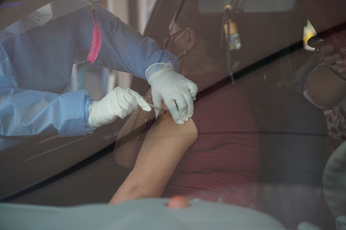 Person being injected with Pfizer-BioNTech Covid-19 vaccine