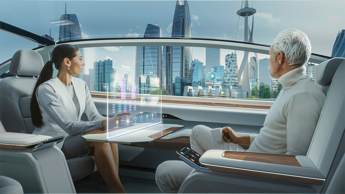 Man and woman in a driverless car