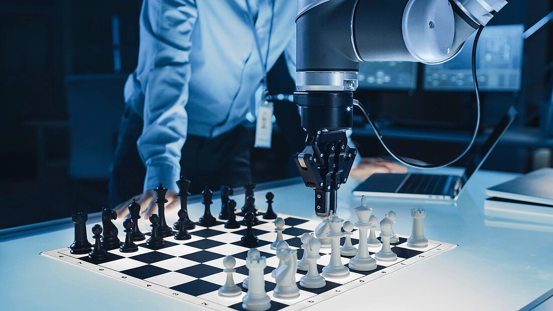 Robotic arm in a game of chess against a human
