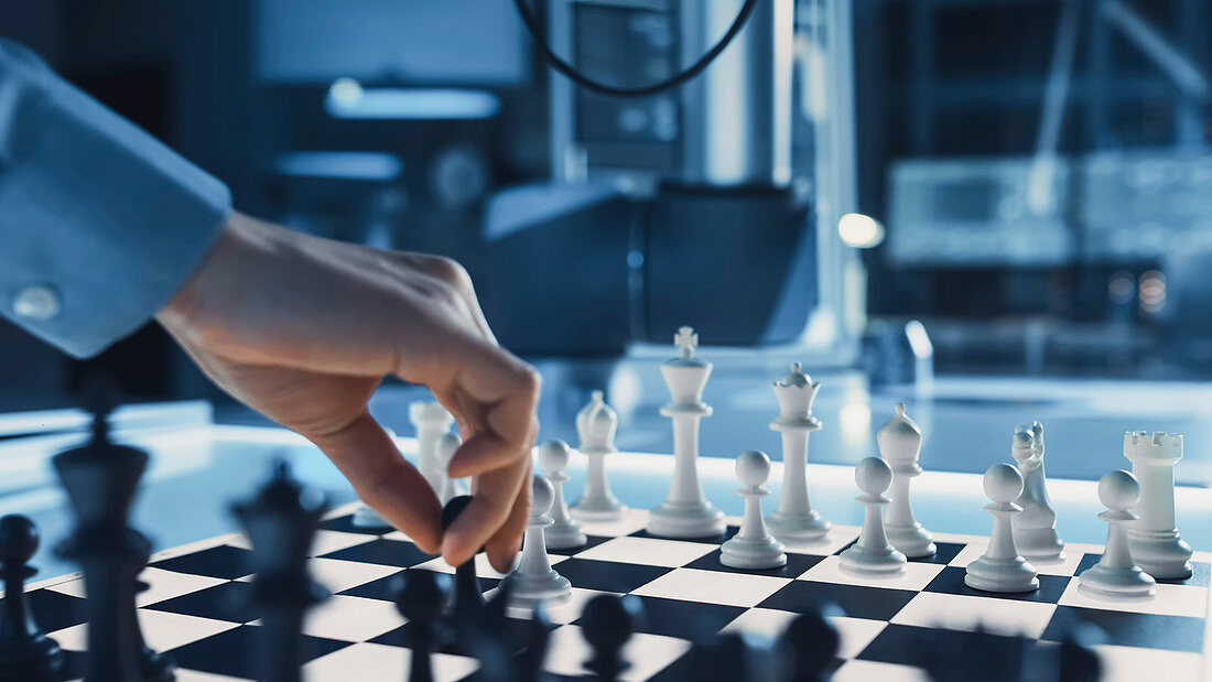 Robotic arm in a game of chess against a human
