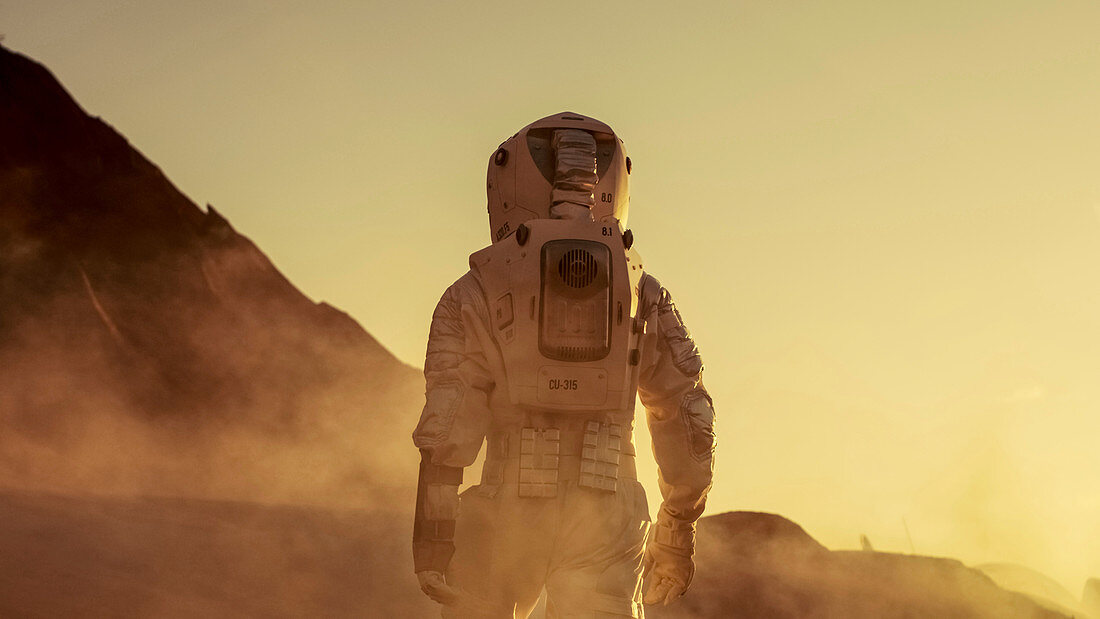 Astronaut walking on alien planet