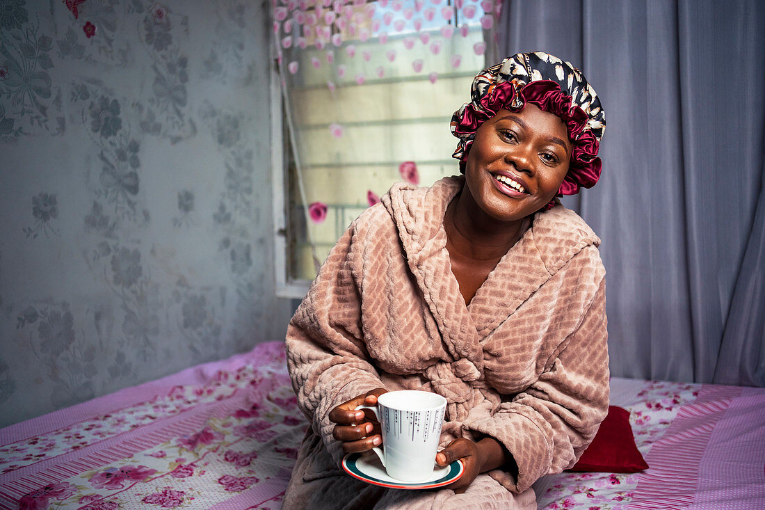 Woman relaxing with hot drink