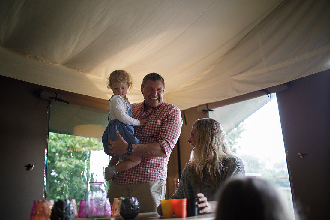 Family in a yurt cabin
