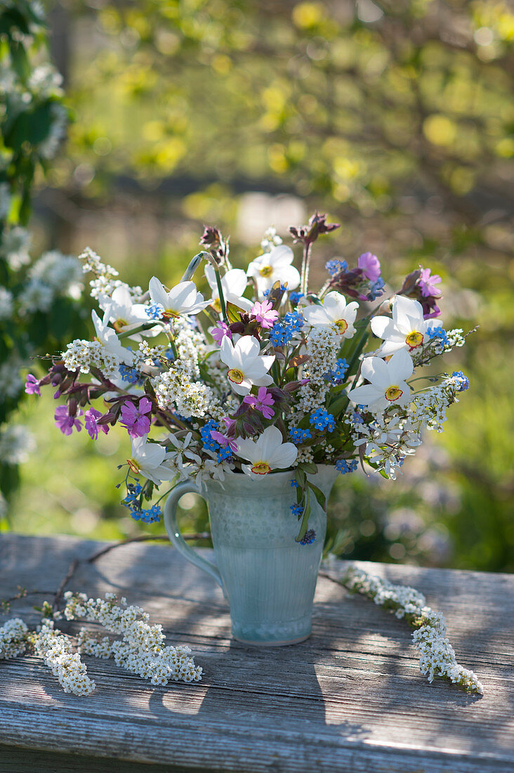 Spring bouquet with daffodils, Bridal Wreath Spirea, forget-me-nots, red campion and shadbush
