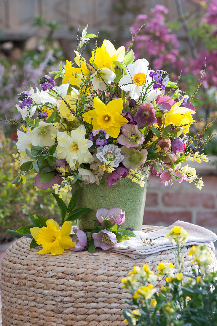 Spring bouquet with daffodils, lenten roses, brooms, and wallflowers