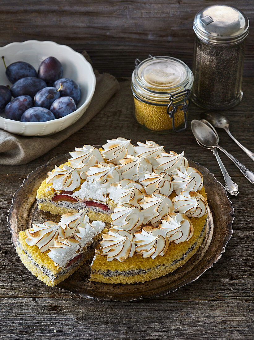 Millet pudding with plums and custard