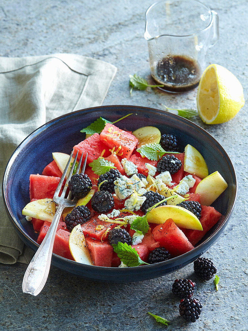 Melon salad with blackberries and pears
