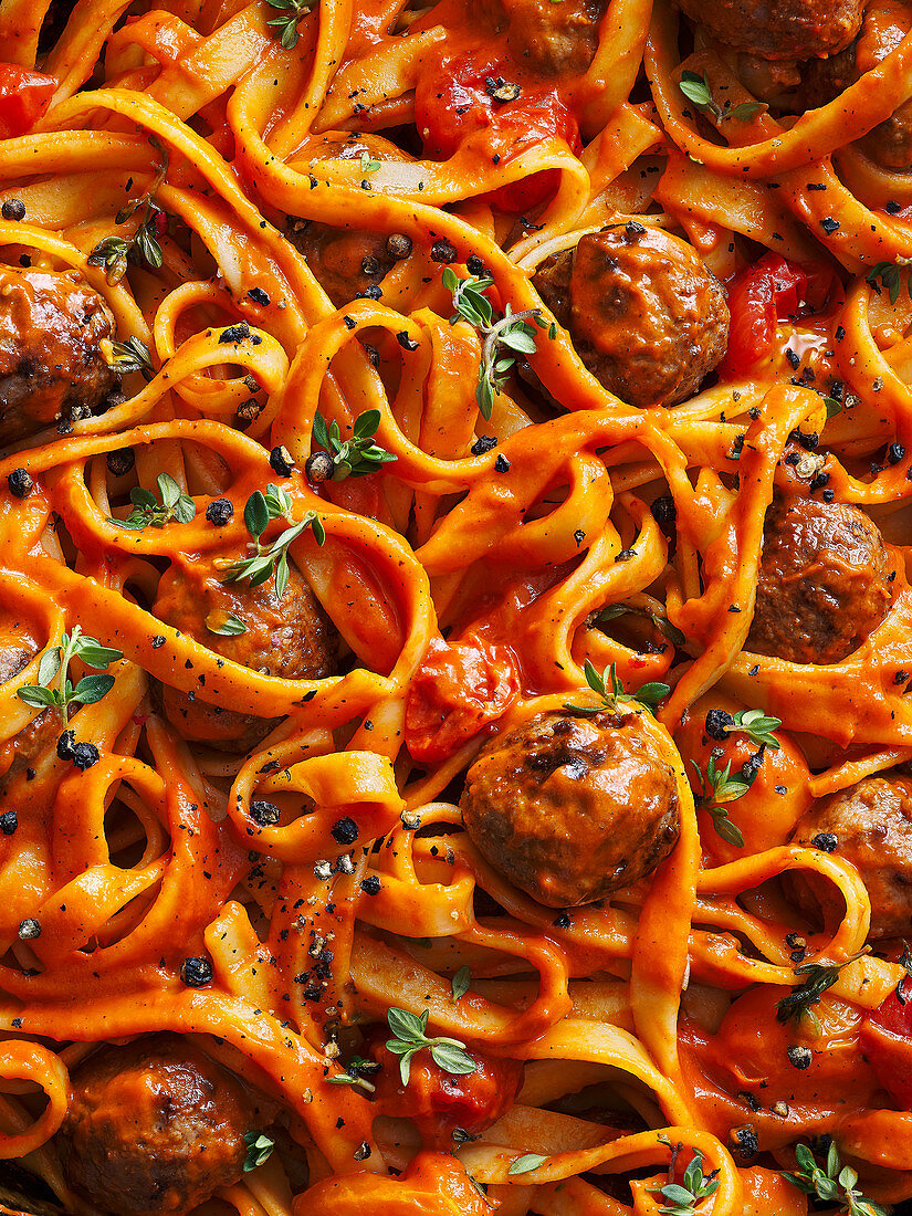Close Up of Tagliatelle with meatballs and tomato sauce