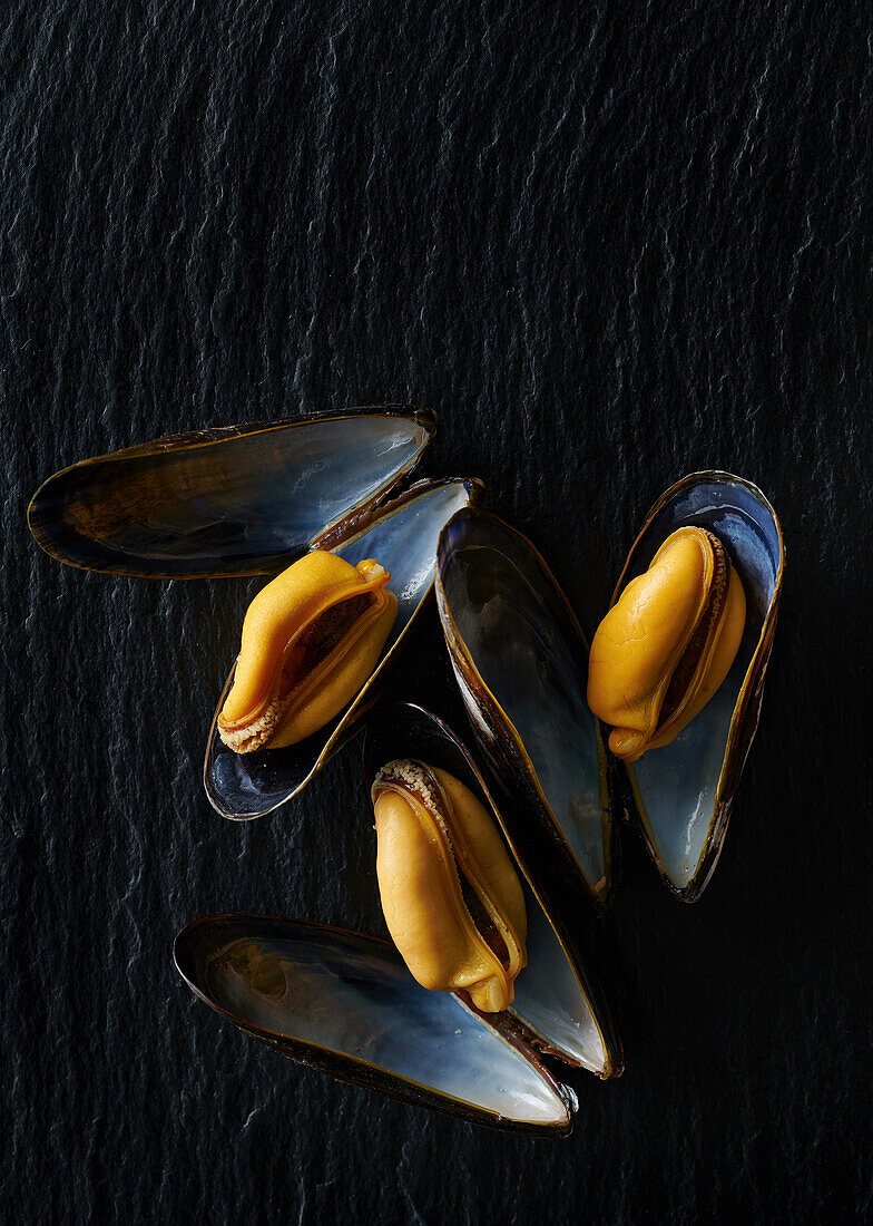 Three cooked mussels