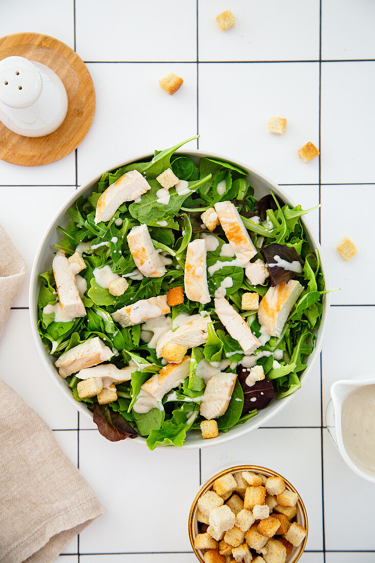 Caesar salad with chicken breast