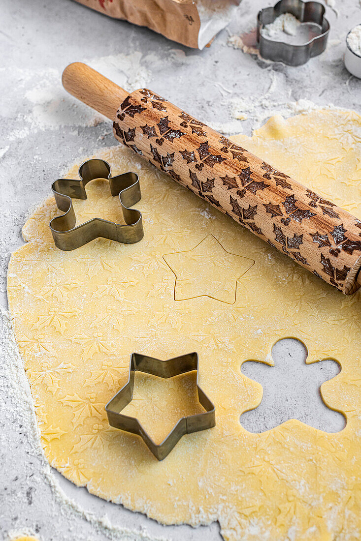 Biscuit dough with rolling pin and biscuit cutters