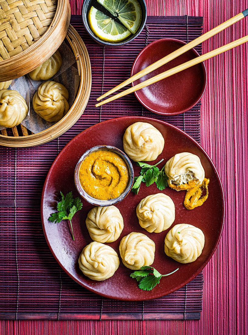 Chicken momos with Nepalese roasted tomato chutney