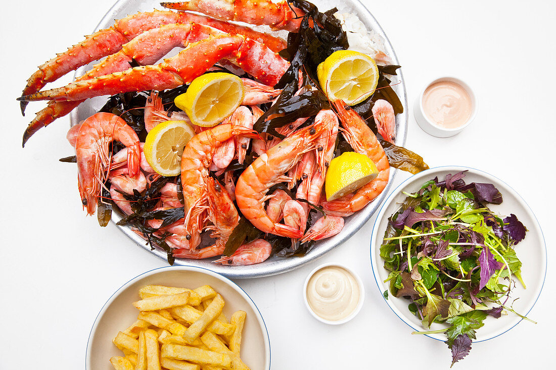 Seafood platter with king prawns, crab and seaweed