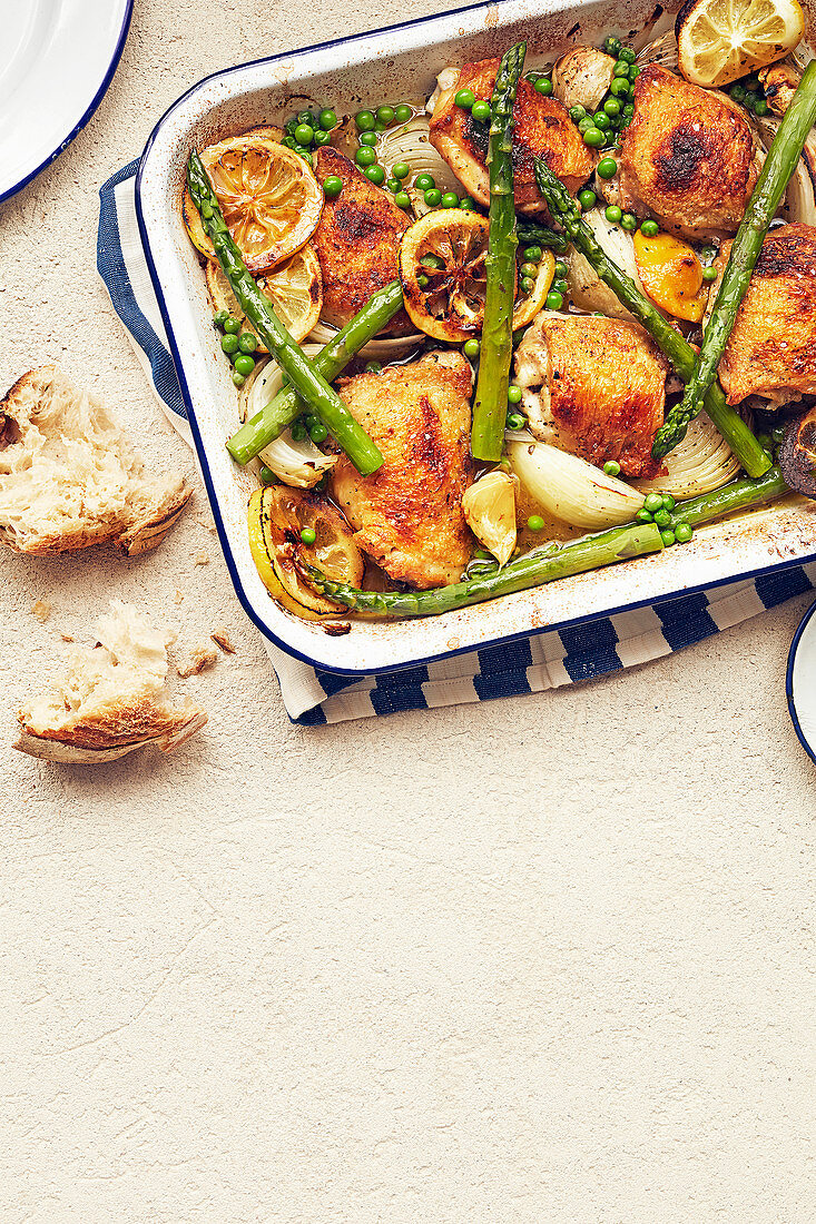 Lemon roasted spring chicken with asparagus